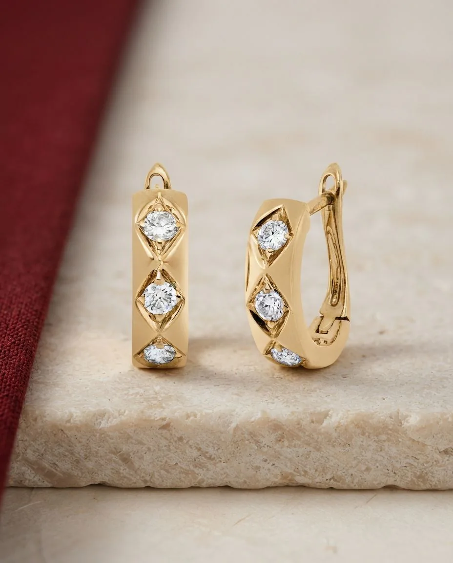 Creolen 18 Karat Gelbgold · drapiert