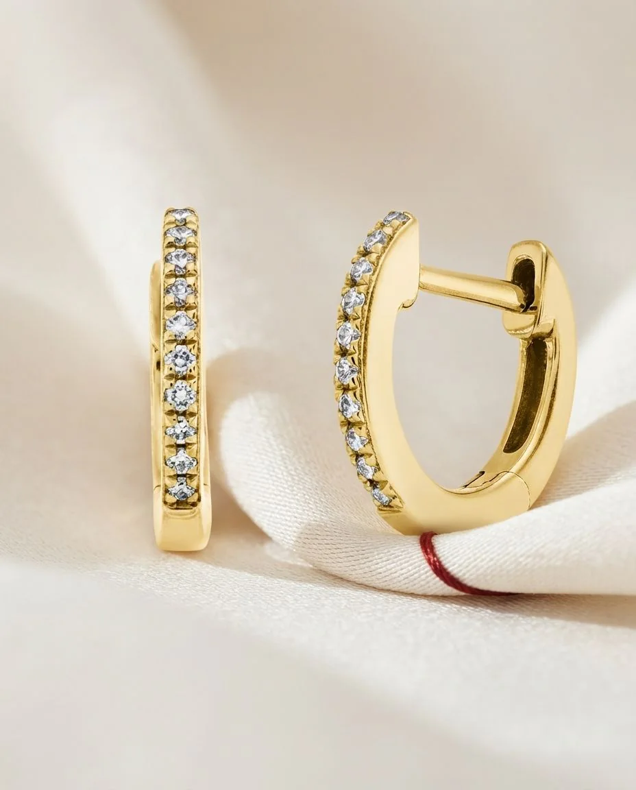 Creolen 18 Karat Gelbgold · drapiert