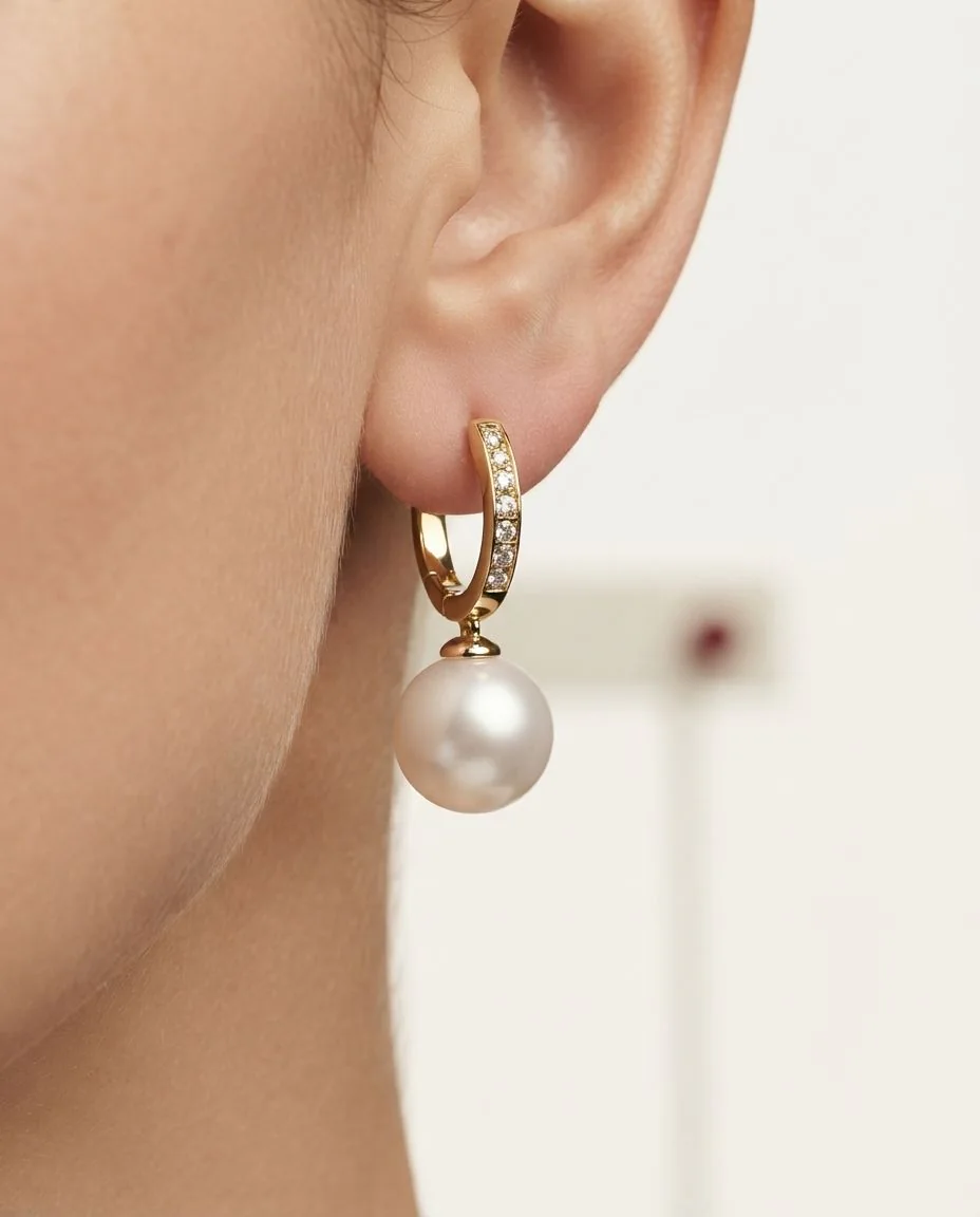 Ohrschmuck 18 Karat Gelbgold · getragen