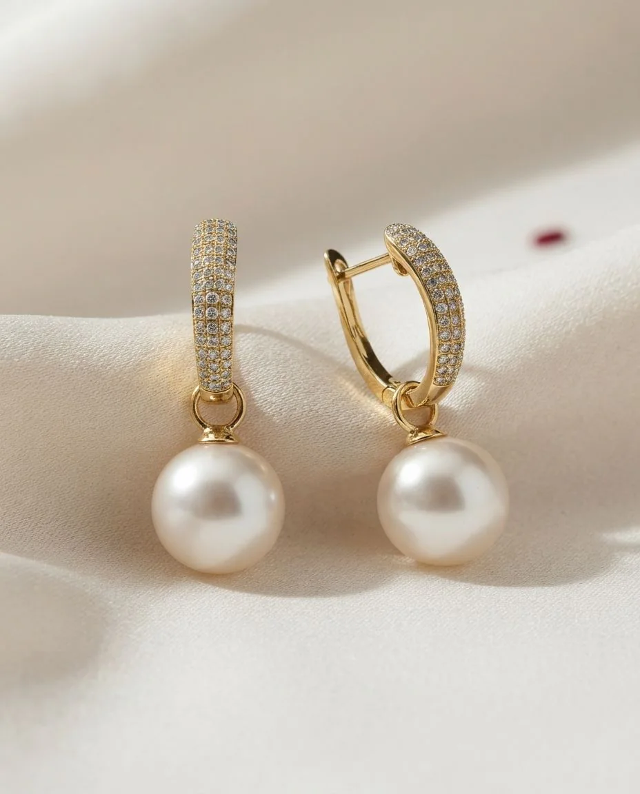Ohrschmuck 18 Karat Gelbgold · drapiert