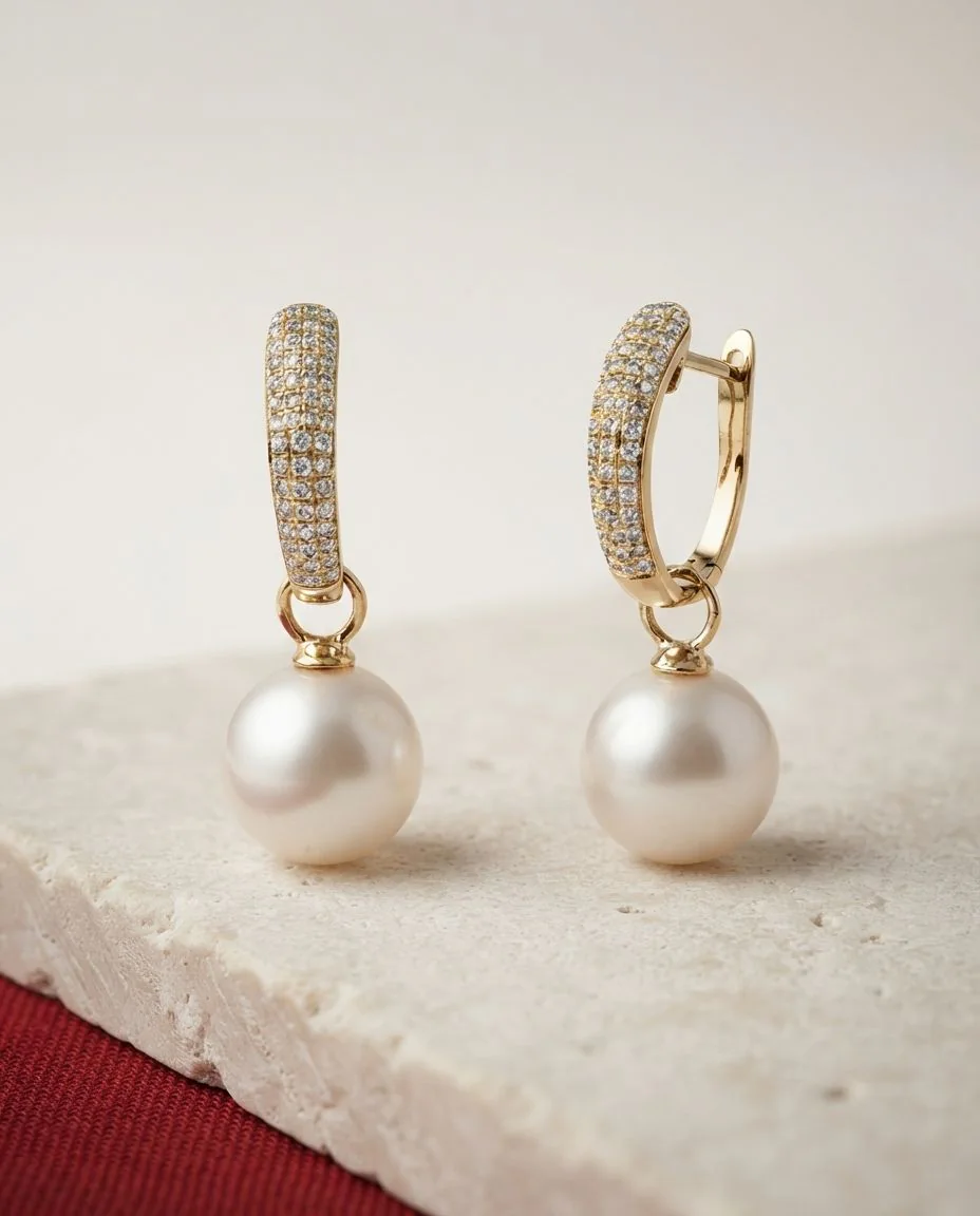 Ohrschmuck 18 Karat Gelbgold · drapiert