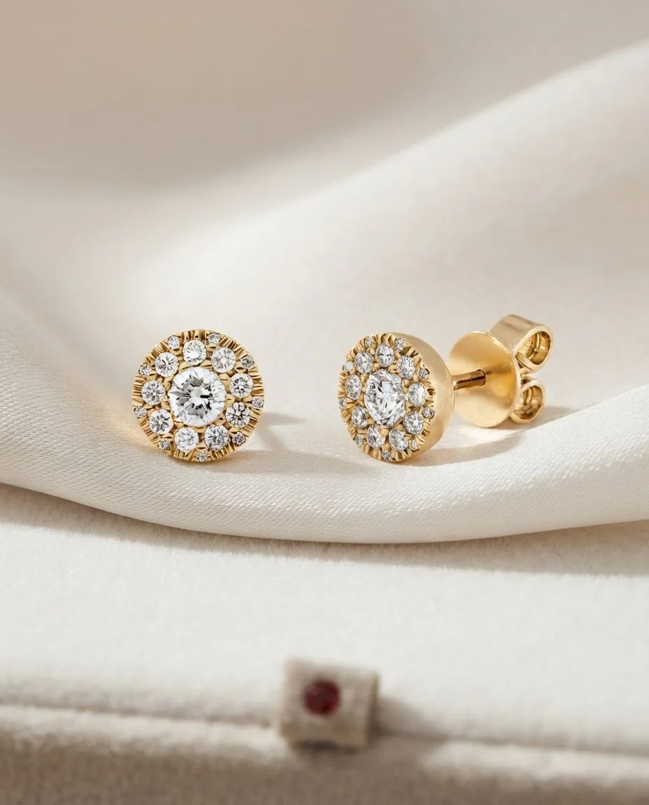 Ohrstecker 14 Karat Gelbgold · drapiert