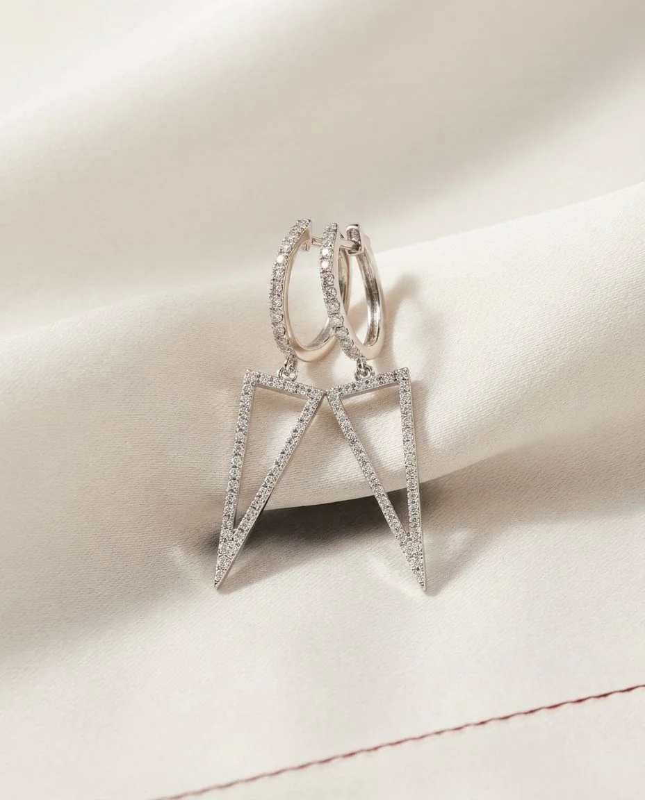 Ohrschmuck 14 Karat Weißgold · drapiert