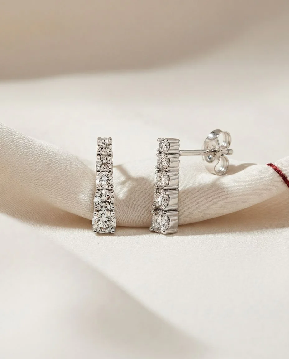 Ohrschmuck 14 Karat Weißgold · drapiert