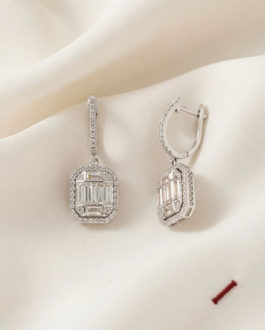 Ohrschmuck 14 Karat Weißgold · drapiert