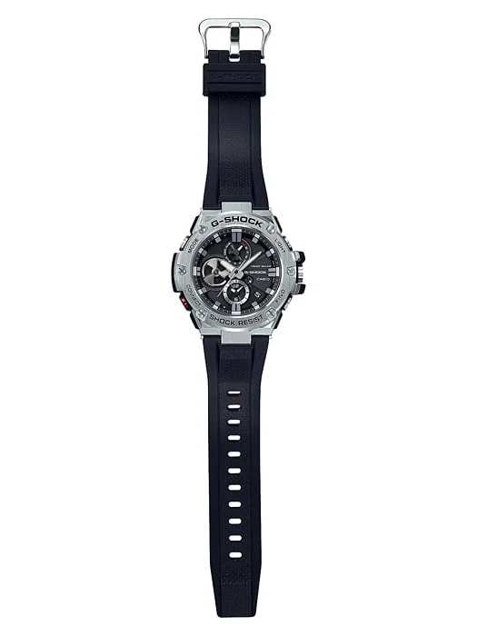 Komplettansicht der flach liegenden G-SHOCK Armbanduhr GST-B100-1A.