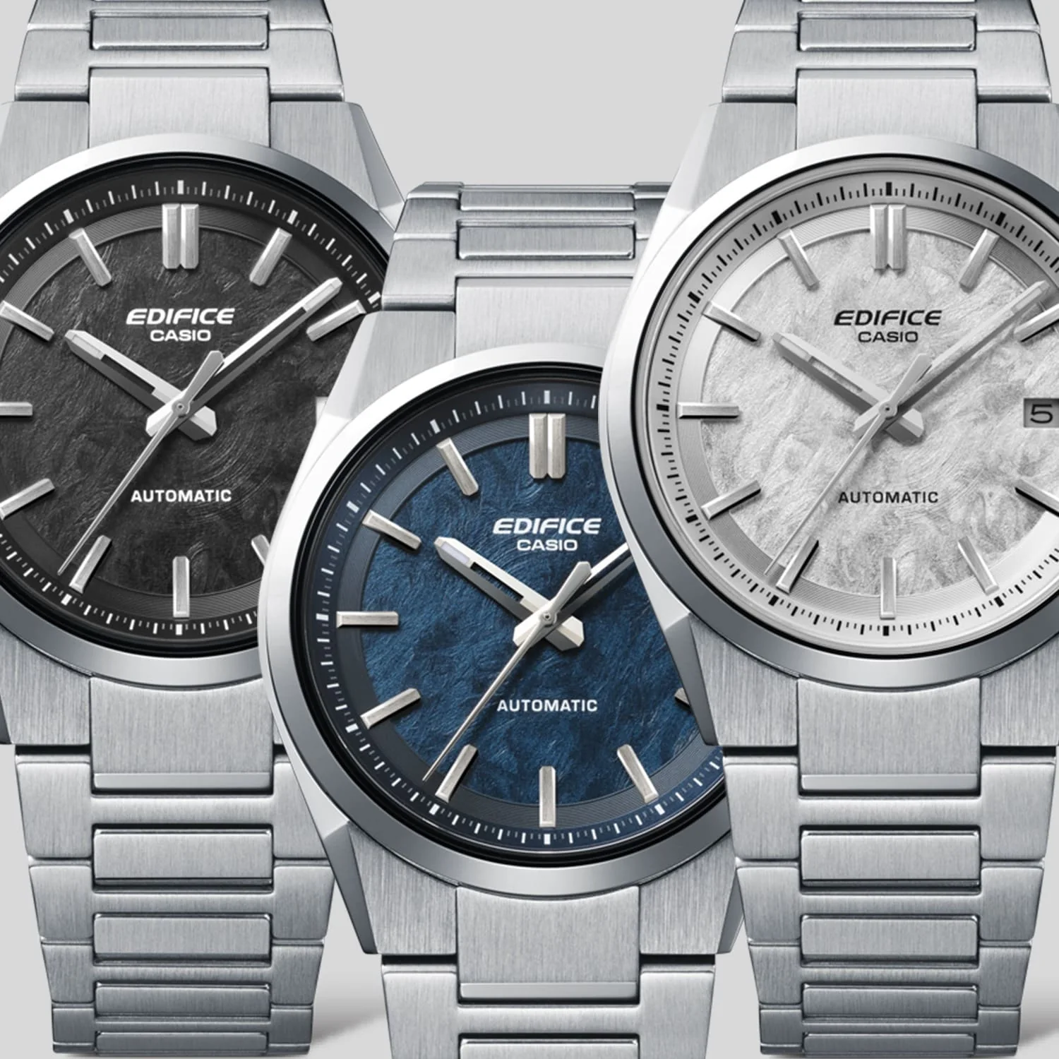 Drei Modelle der EFK-110D Serie mit schwarzem, blauem und weißem Zifferblatt nebeneinander